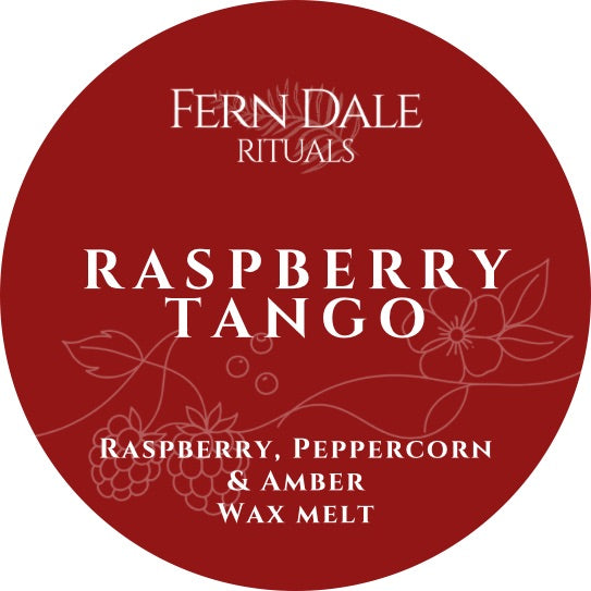 Raspberry Tango round red wax melt label with white lettering and delicate outlines of raspberries, leaves and a flower.